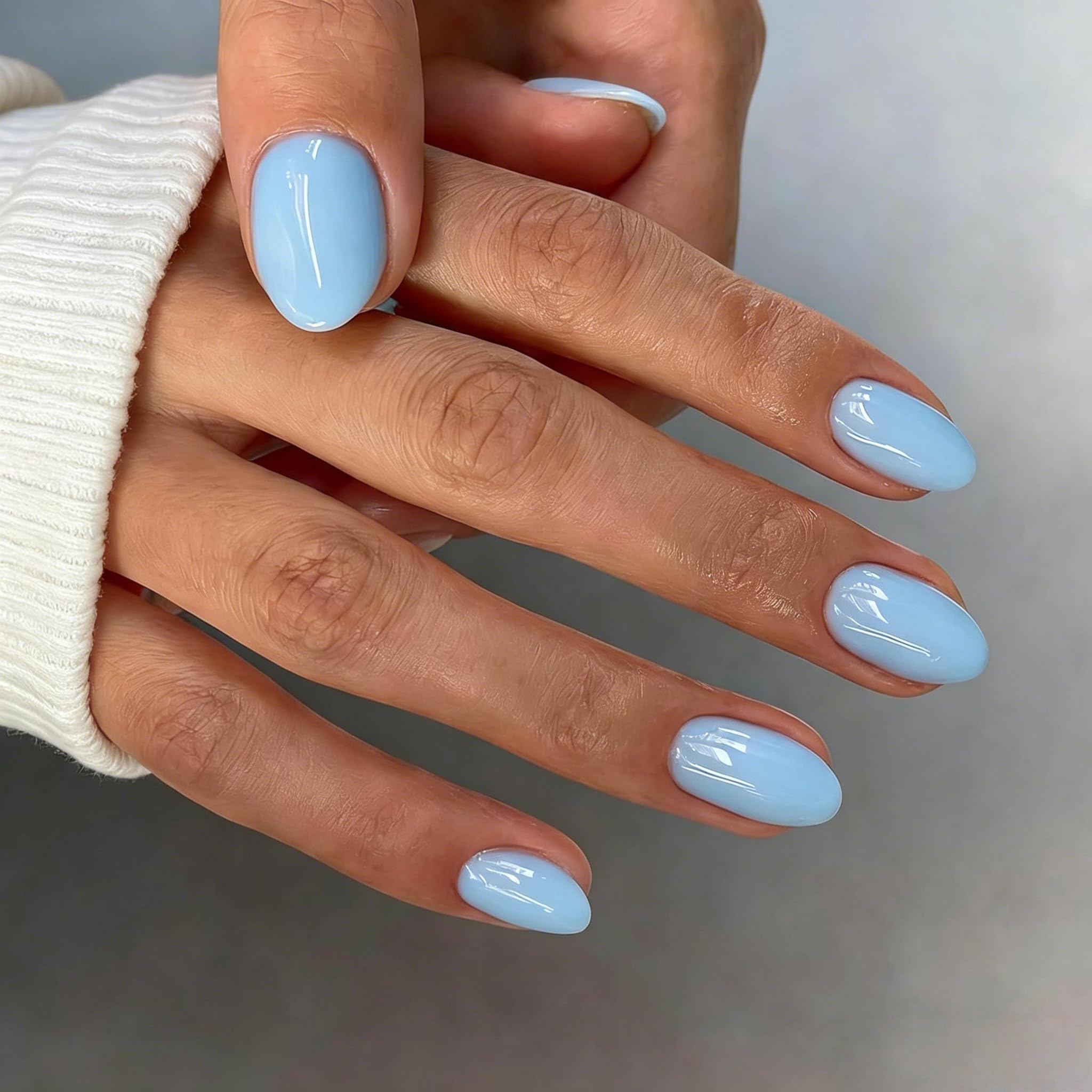 KXAMELIE front packaging showing 32-piece pale blue set and included tools