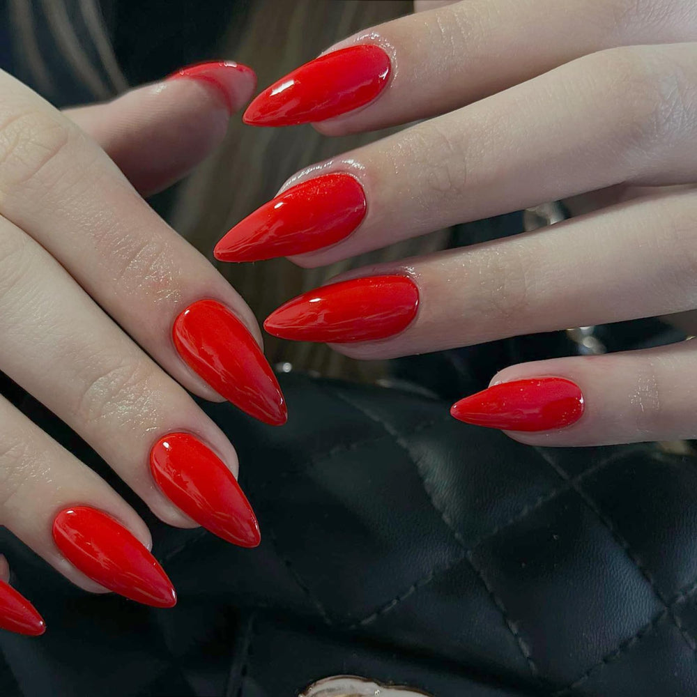 kxamelie hand wearing nails for size comparison and instant style boost