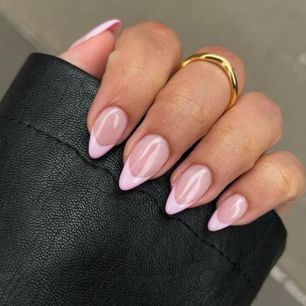 KXAMELIE shown during application with adhesive tab for easy use
