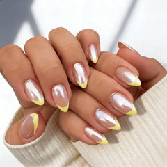 KXAMELIE short almond nails on hands demonstrating natural look