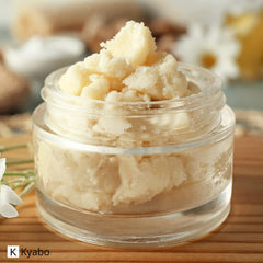 Kyabo shea butter next to ruler illustrating 5 lb quantity and value