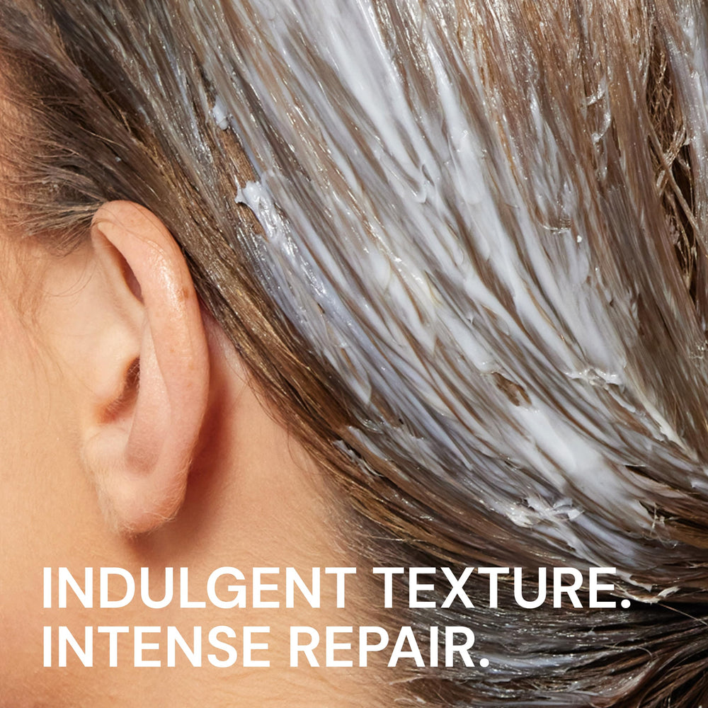 L'ANGE HAIR being applied in shower for easier detangling benefit