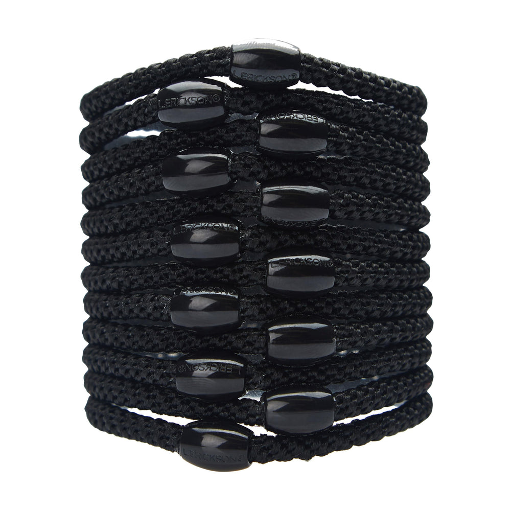 L. Erickson pack of 12 black hair ties showing neat, travel-ready packaging and convenience