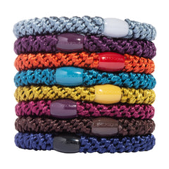 L. Erickson front pack showing eight fall-colored hair ties and neat packaging benefit convenience
