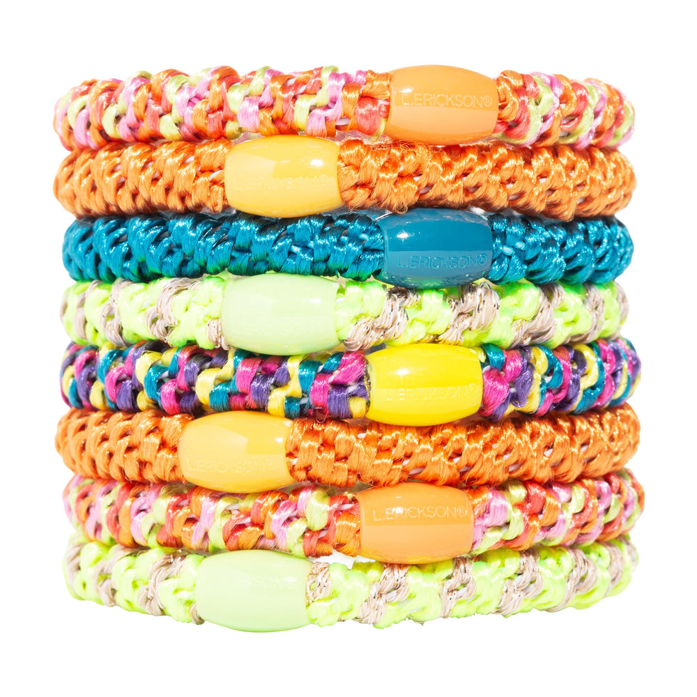 L. Erickson front pack showing eight neon hair ties and bold colors for easy choice