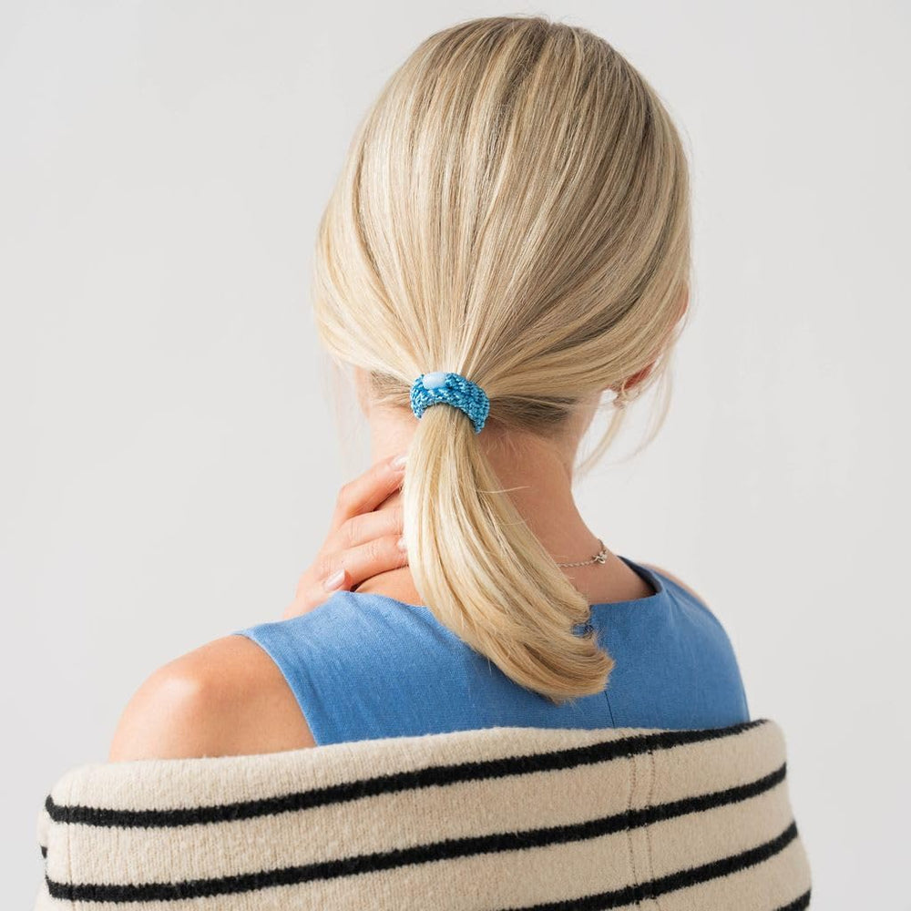 L. Erickson hair ties inside a bag for convenient grab-and-go use