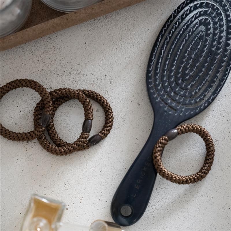 L. Erickson on bathroom counter in morning routine illustrating everyday use