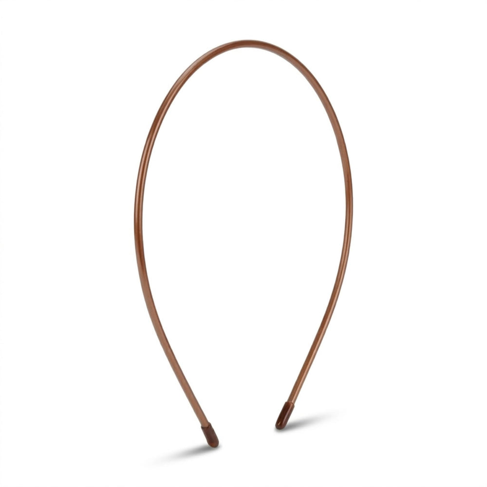L. Erickson front view of thin tortoise headband showing slim profile and polished look