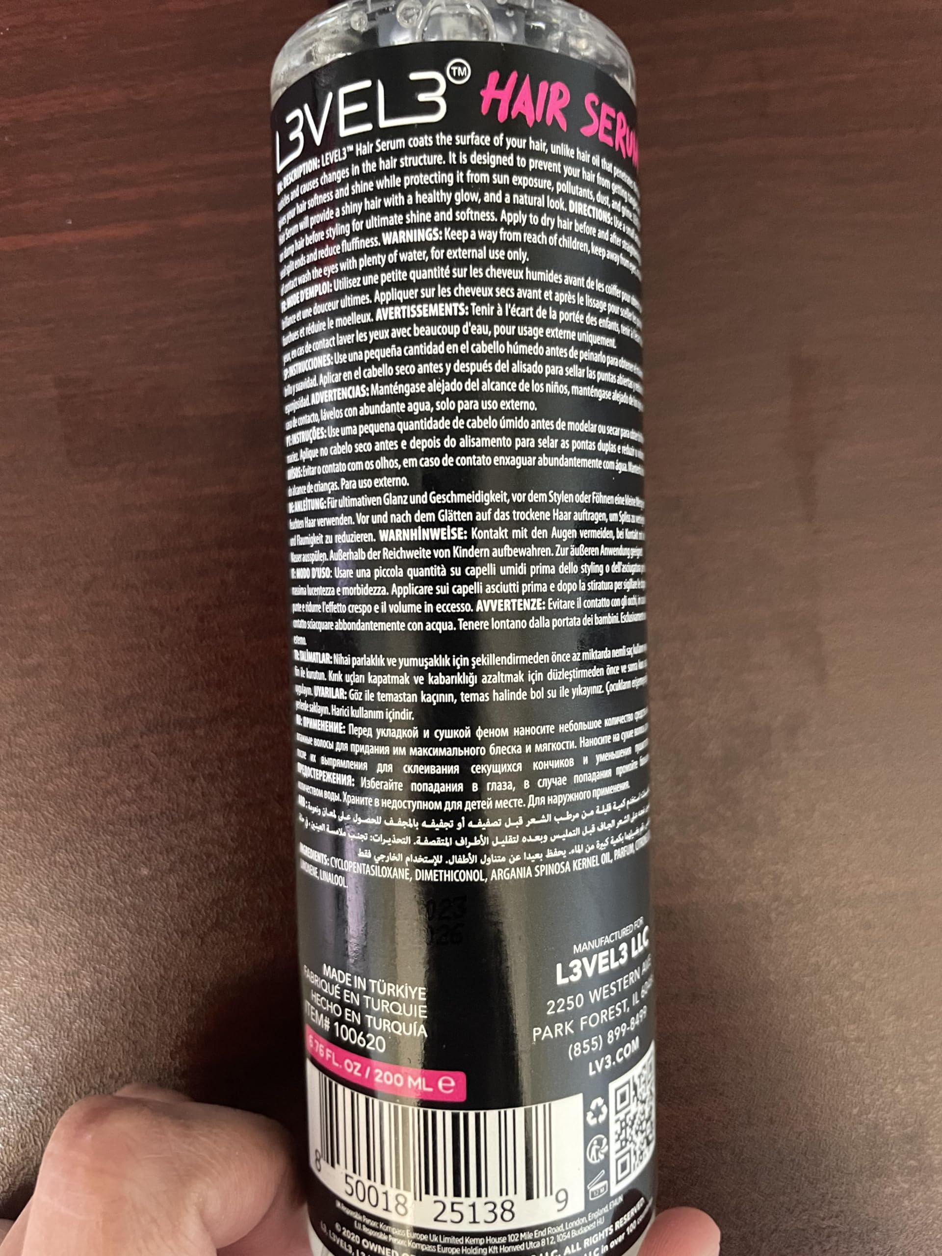 L3 bottle next to a coin showing compact size and travel-friendly benefit