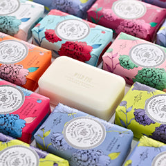 La Chatelaine rich lather closeup on hands demonstrating creamy foam and moisturizing benefit