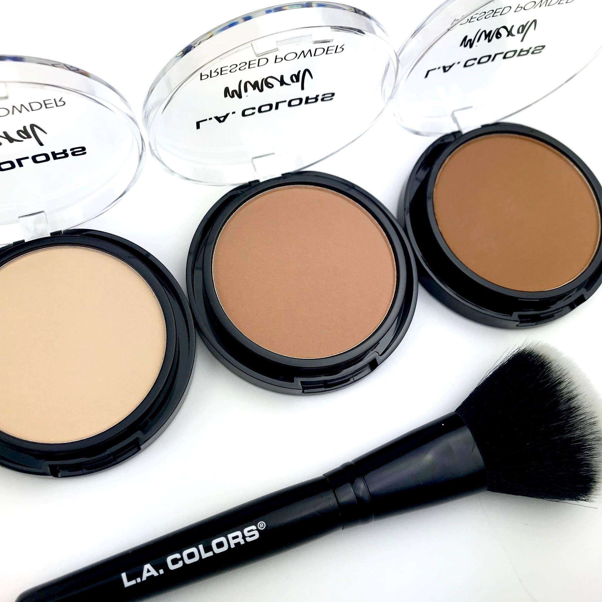 L.A. COLORS compact held in hand showing compact size for on-the-go touchups