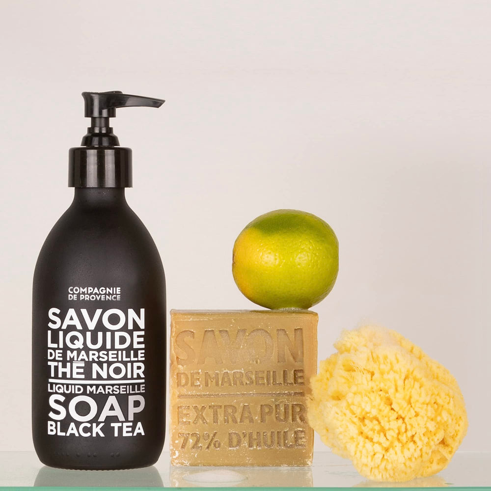 La Compagnie de Provence bottle on bathroom counter showing styled lifestyle placement benefit: elevates decor