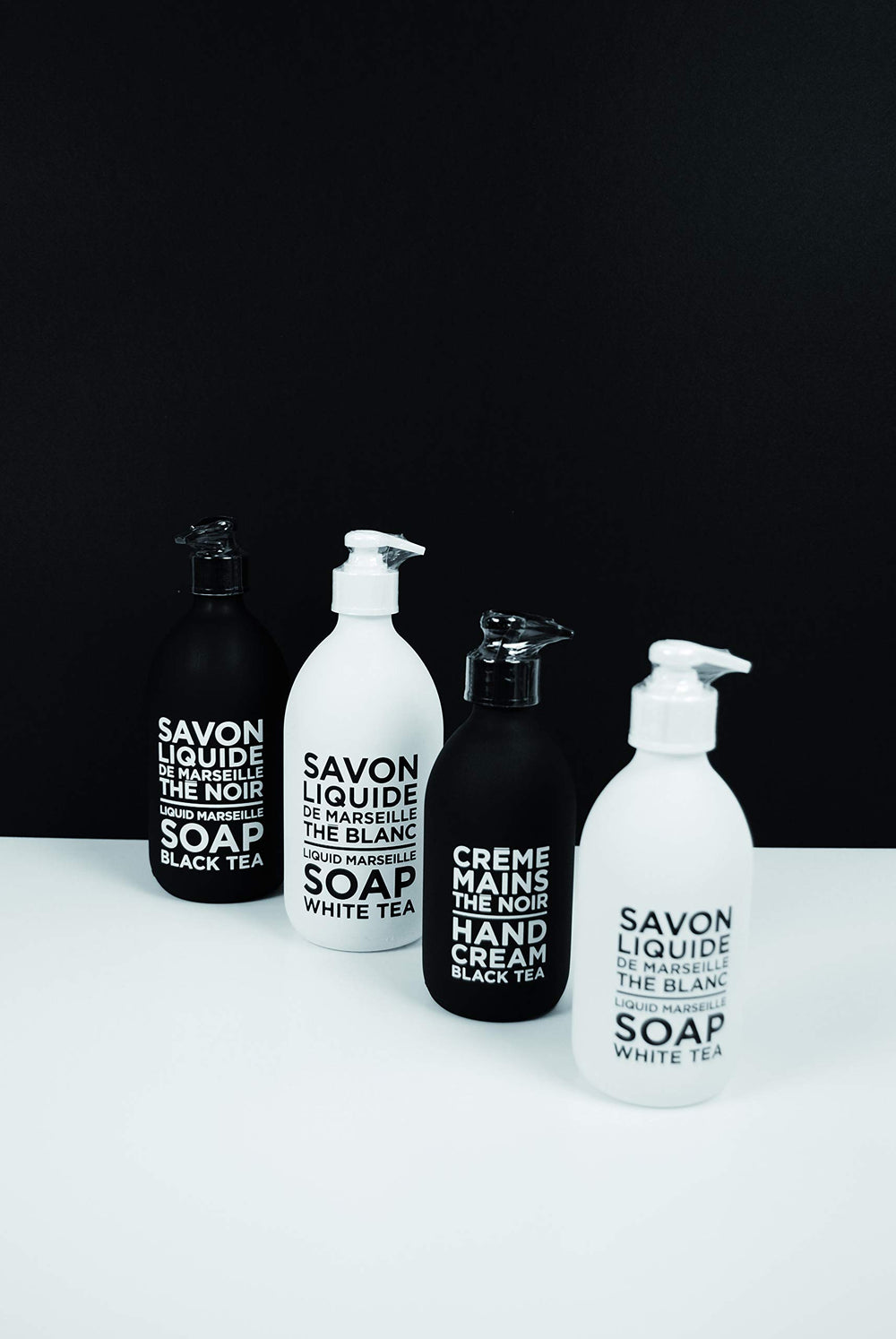 La Compagnie de Provence pouring refill into bottle showing refillable design benefit: waste reduction
