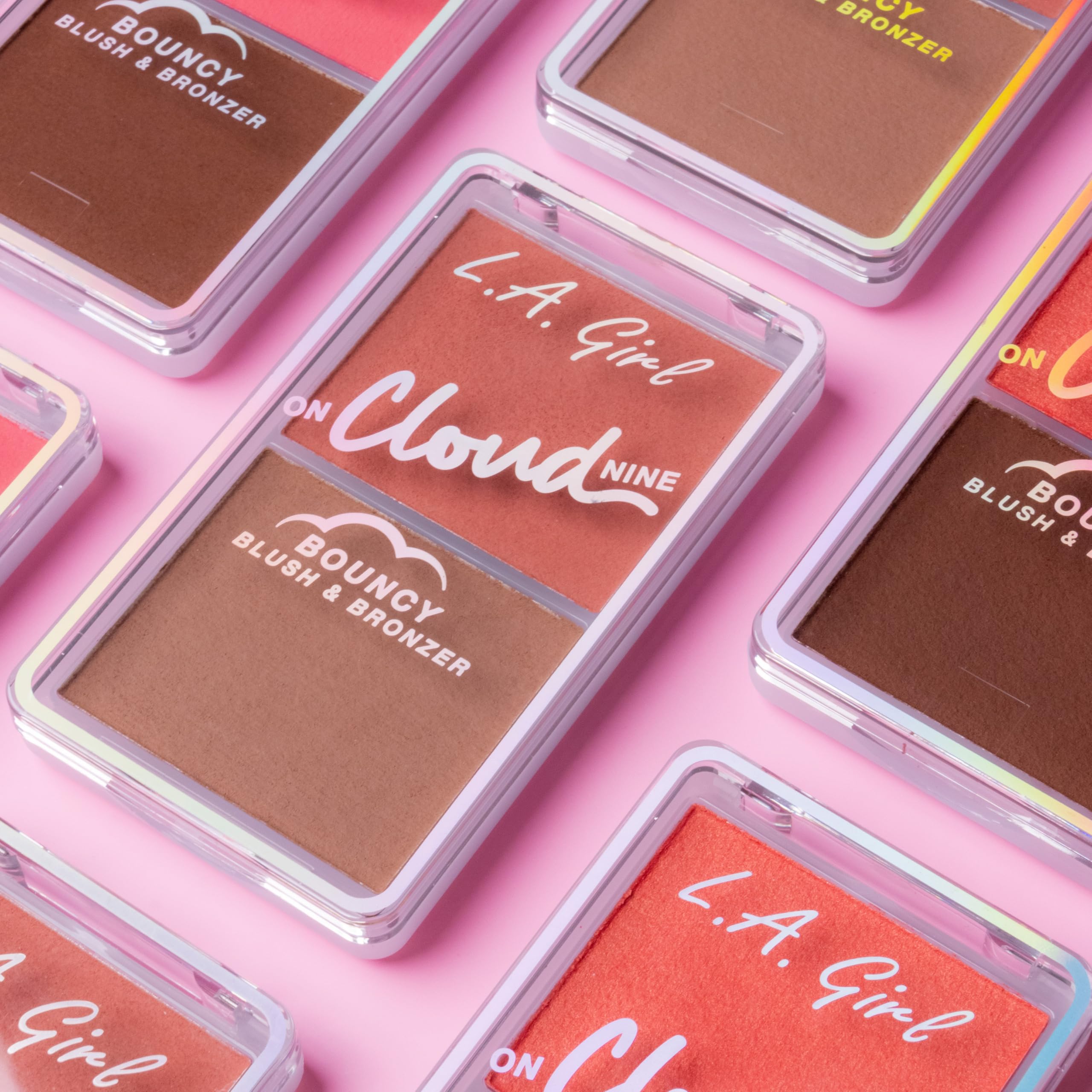L.A. Girl compact held in hand showing pocket-friendly travel size