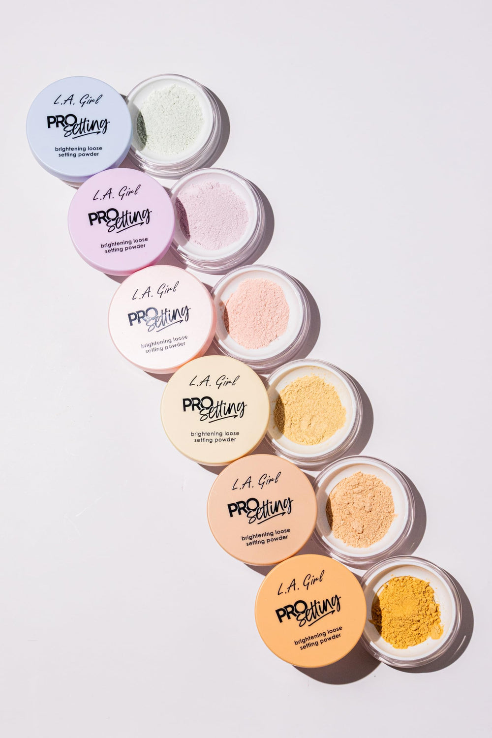 L.A. Girl open jar with visible label showcasing ingredients and brightening benefit