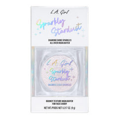 L.A. Girl arm swatch close-up showing buildable shimmer and glow