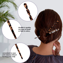 La Jolie Jasmin hair sticks holding a bun showing secure hold and polished look