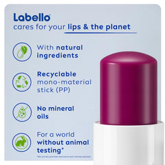 Labello BlackBerry Shine in a handbag scene illustrating on-the-go touch-up convenience