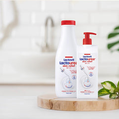 Lactovit bottle label closeup displaying active ingredients and dermatologist recommendation