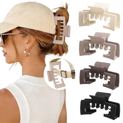 Lahnie front view of four claw clips showing neutral matte colors and packaging benefit convenience