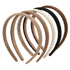 Lahnie headband on a tabletop next to casual outfit pieces showing easy outfit coordination