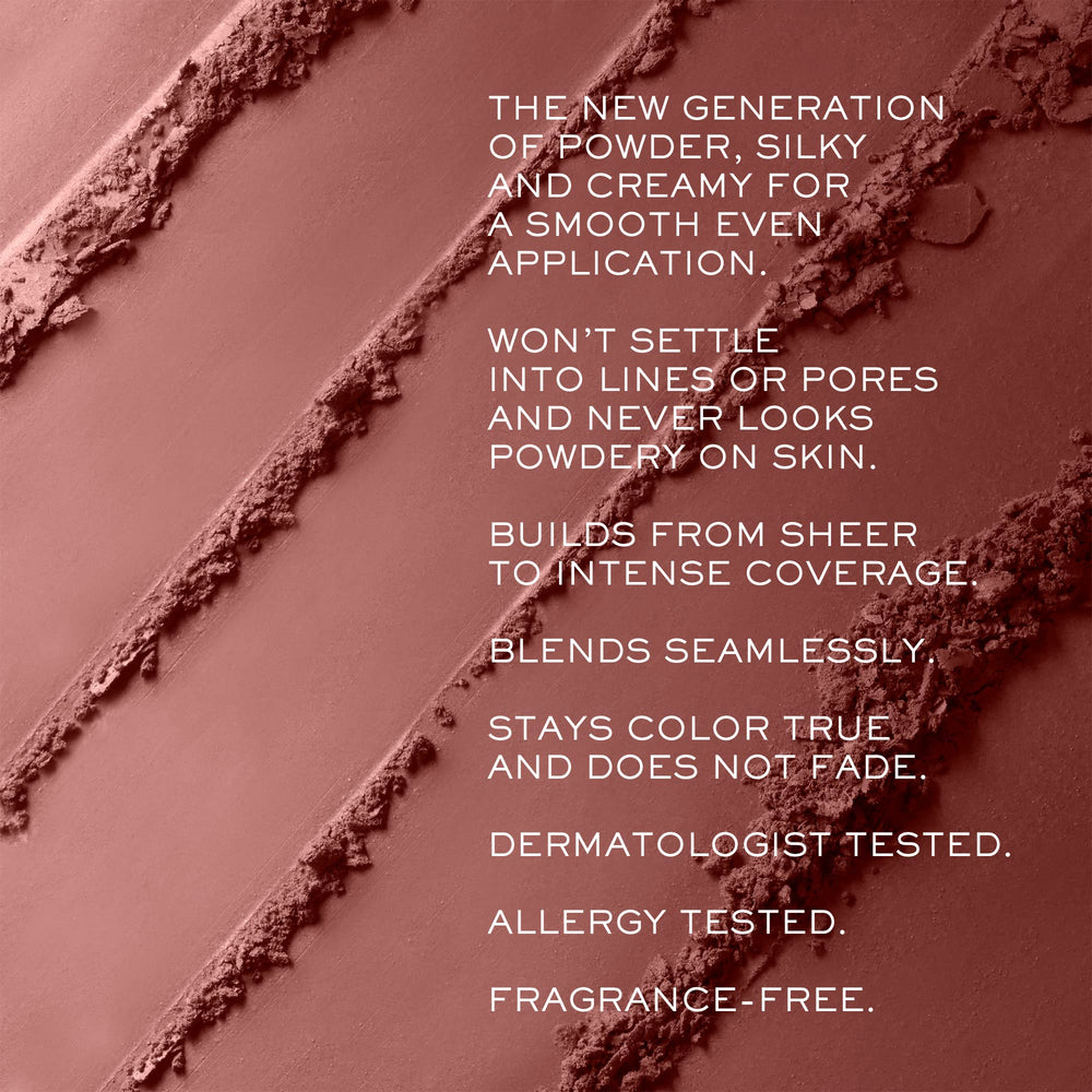Lancôme brush blending close-up showing powder texture and seamless application benefit