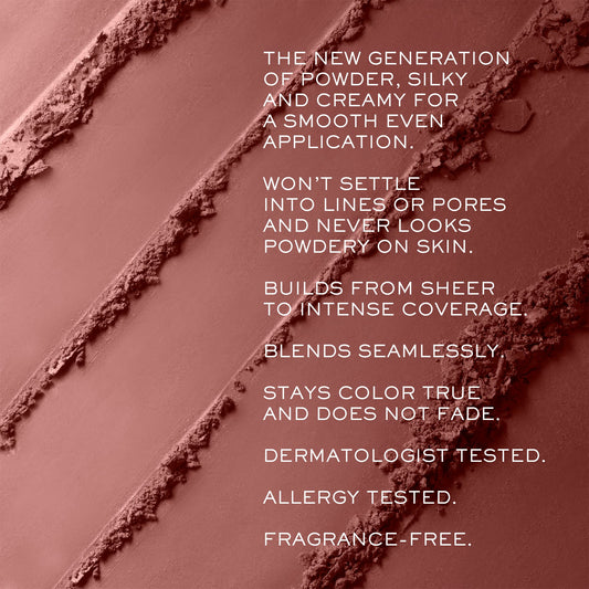 Lancôme brush blending close-up showing powder texture and seamless application benefit