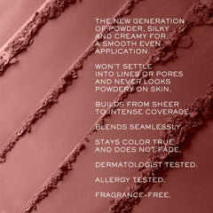 Lancôme brush blending close-up showing powder texture and seamless application benefit