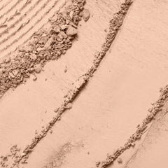 Lancôme powder close-up texture showing finely milled finish for natural look