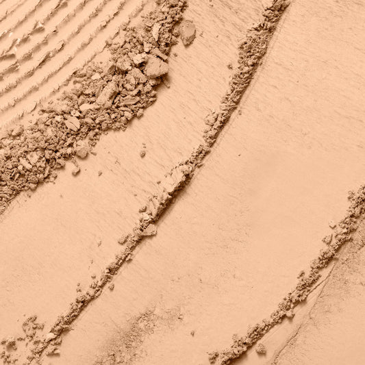Lancôme powder texture close-up demonstrating fine, blendable formula