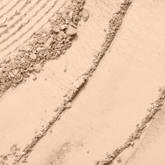 Lancôme powder texture close-up revealing creamy, blendable finish