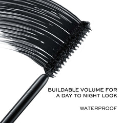 Lancôme mascara swatch showing creamy texture and buildable black pigment