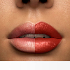 Lancôme lipstick next to coin showing scale and convenient size for handbag portability