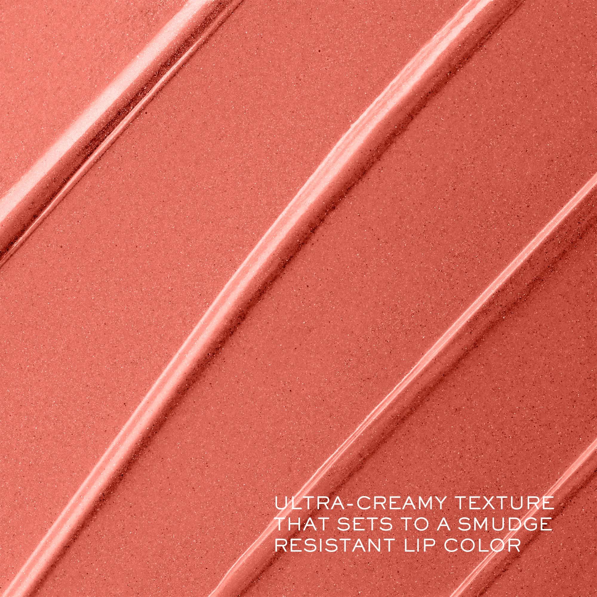Lancôme lipstick held in hand demonstrating size and real-world scale