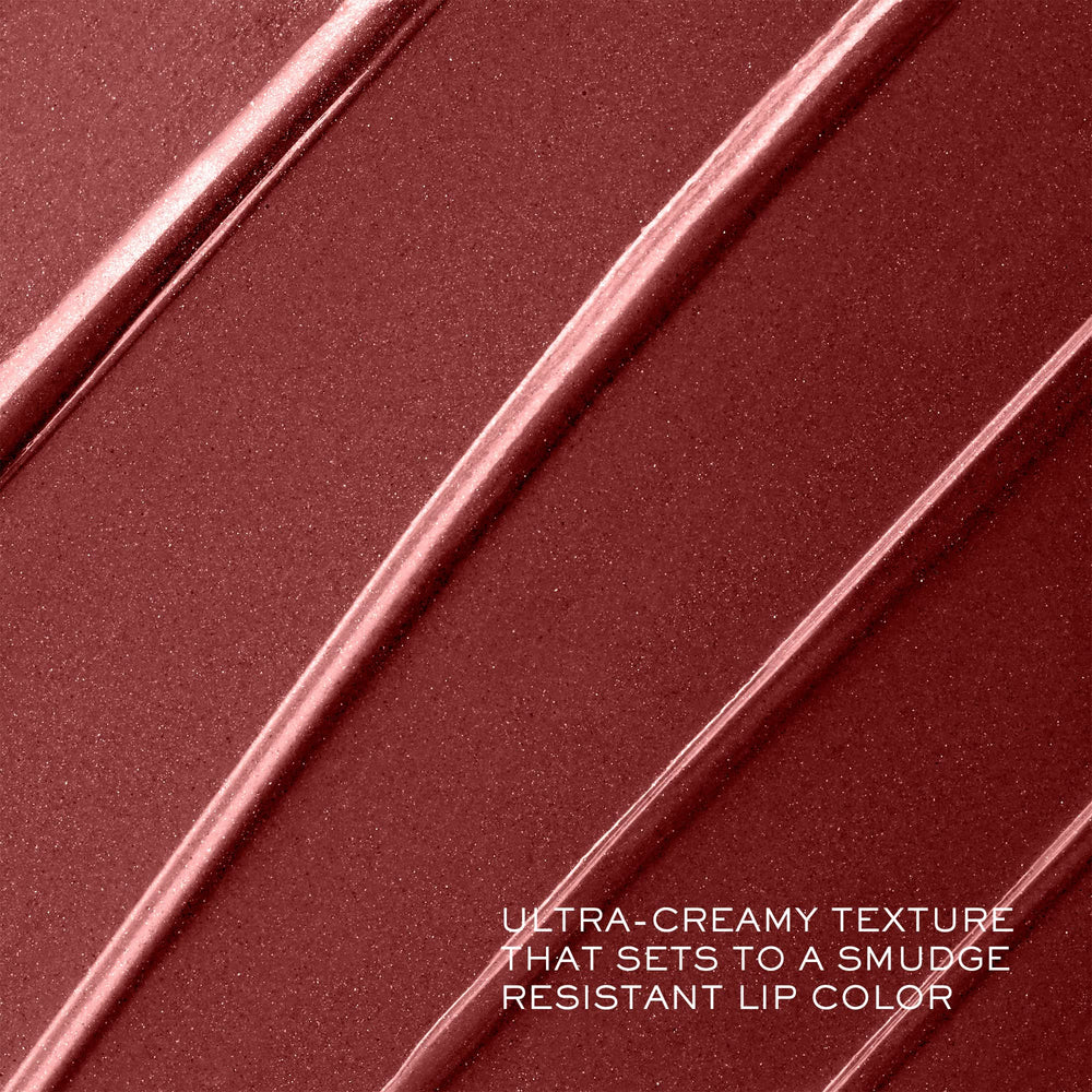 Lancôme lipstick worn on model smiling demonstrating flattering color and confidence