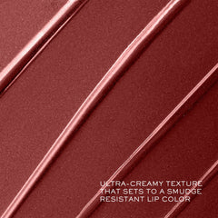 Lancôme lipstick worn on model smiling demonstrating flattering color and confidence