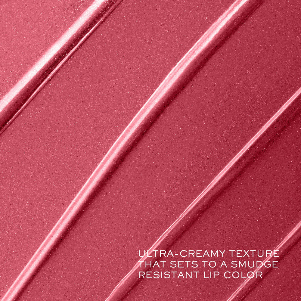 Lancôme lipstick held in hand to show size and scale for application ease
