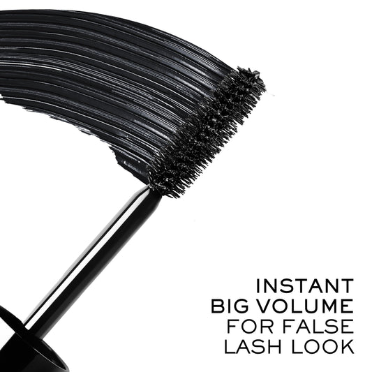 Lancôme close-up of big brush fibers depositing creamy formula for intense volume
