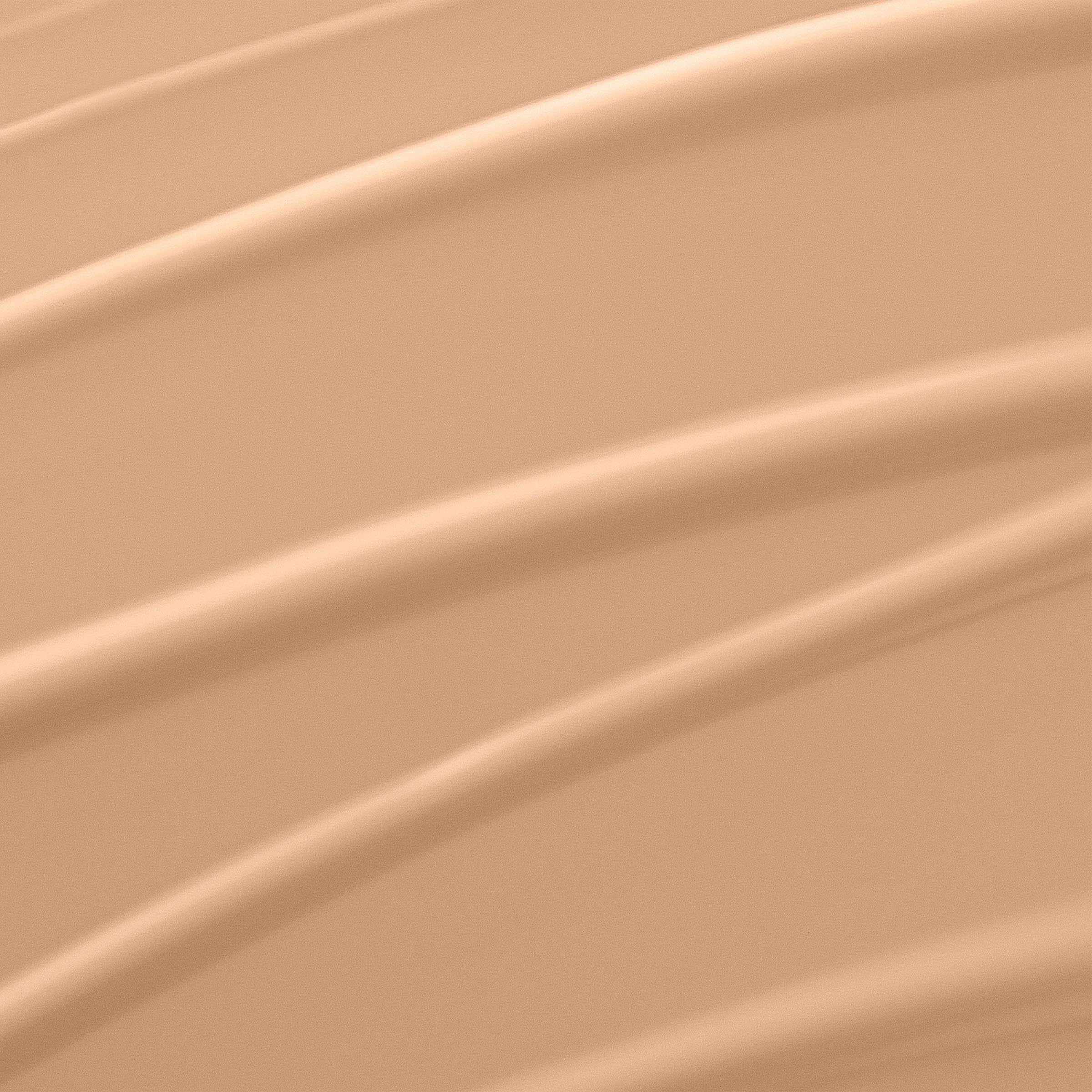 Lancôme pump detail demonstrating precise dispensing with clean finish
