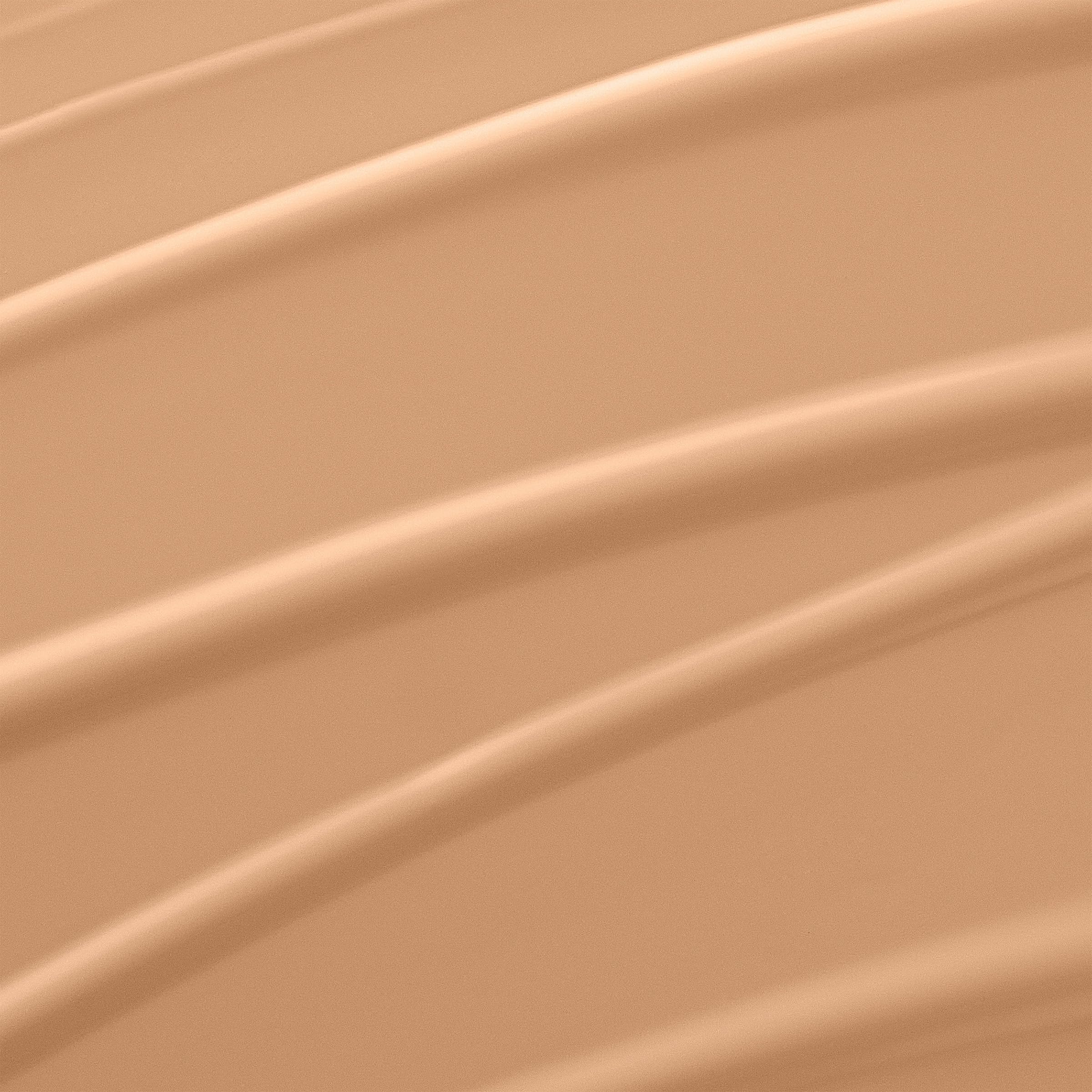 Lancôme foundation pump open displaying dispensing mechanism for controlled use