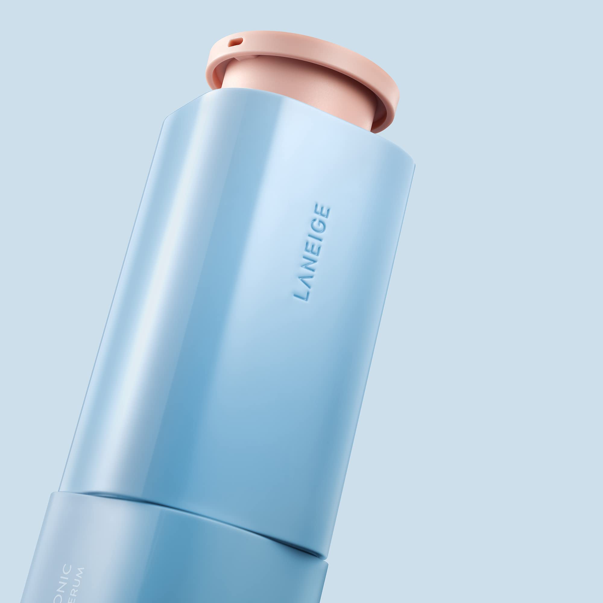 LANEIGE serum held in hand showing size and easy daily application benefit