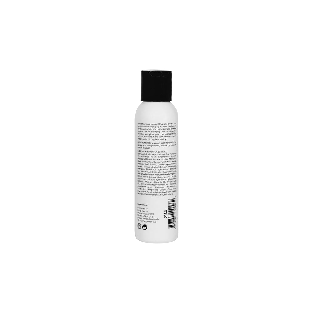 L'ANGE HAIR in a blowout lifestyle setting showing glossy finished hair and long-lasting style benefit