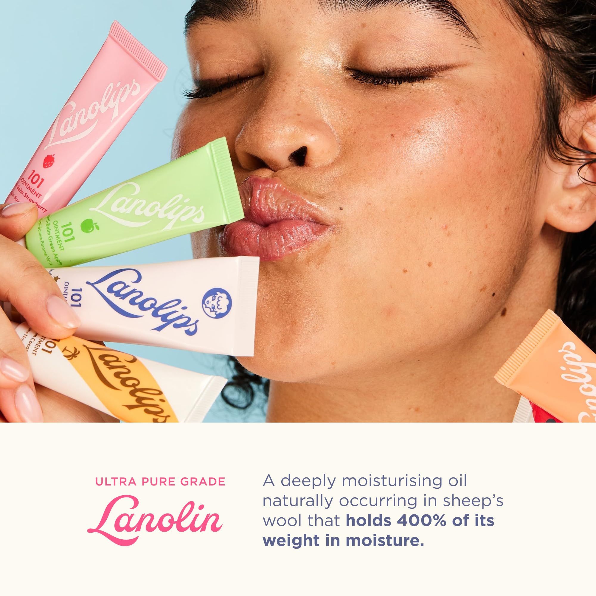Hand holding Lanolips 101 tin to show size and easy portability for on-the-go relief