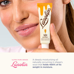 Applying Lanolips 101 to lips for instant soothing and protection