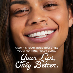 Smiling model wearing Lanolips rose tint illustrating natural color and confident look