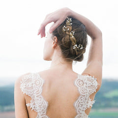 LAPOHI close up of rhinestones and pearls highlighting sparkle benefit: refined shine