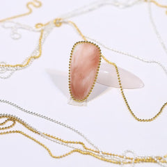 lasenersm chains used to edge a phone case adding a delicate metallic accent