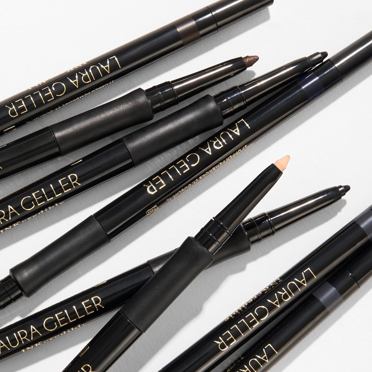 LAURA GELLER NEW YORK pencil next to ruler showing compact travel-friendly size