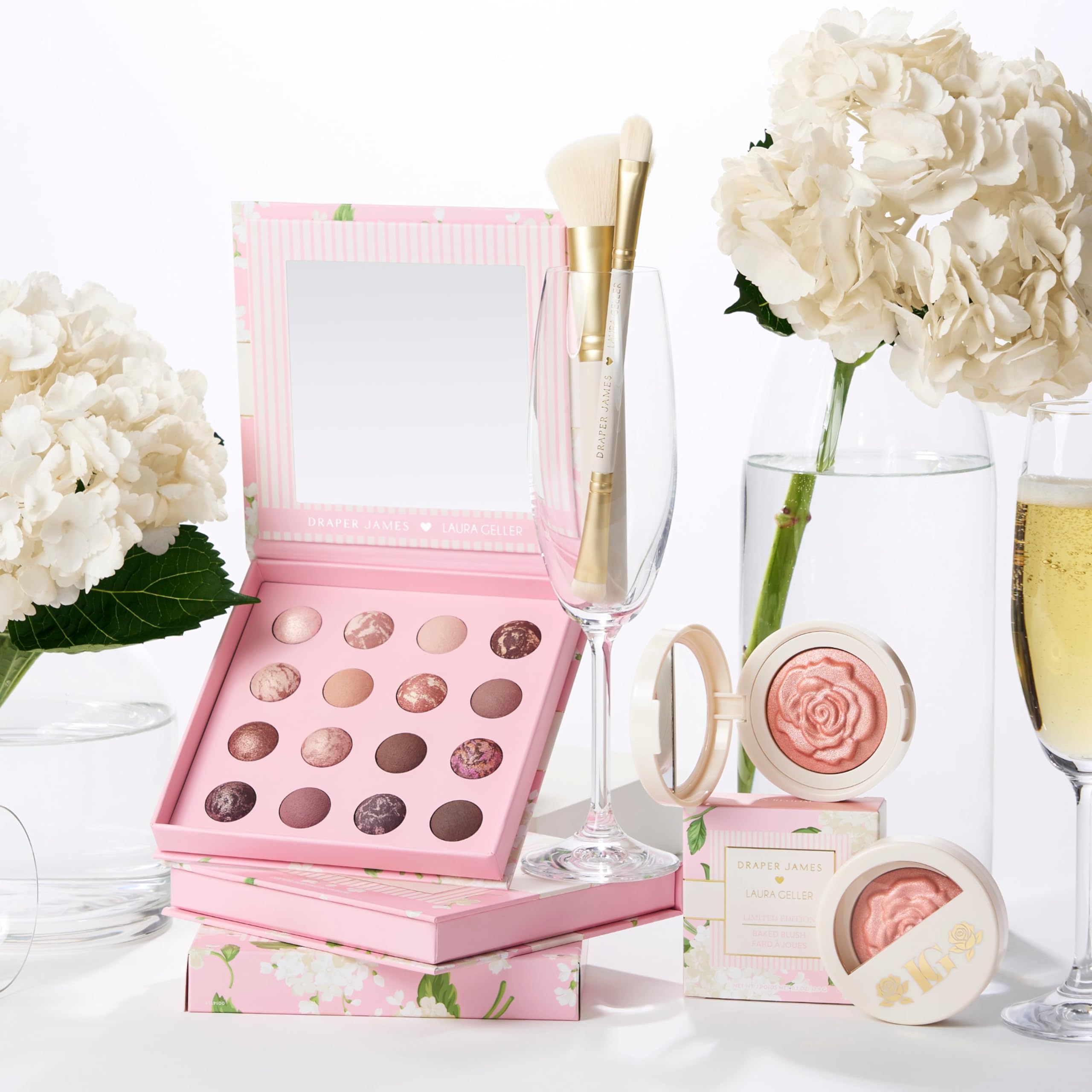 LAURA GELLER NEW YORK brush applying shade to lid illustrating easy buildable color