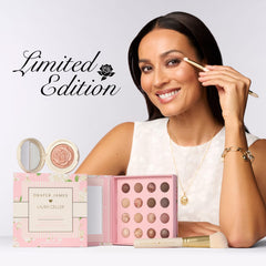 LAURA GELLER NEW YORK palette held in hand to show compact size and travel convenience
